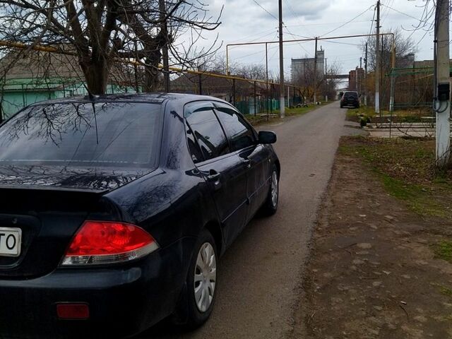 Мицубиси Лансер, объемом двигателя 1.6 л и пробегом 230 тыс. км за 3400 $, фото 2 на Automoto.ua