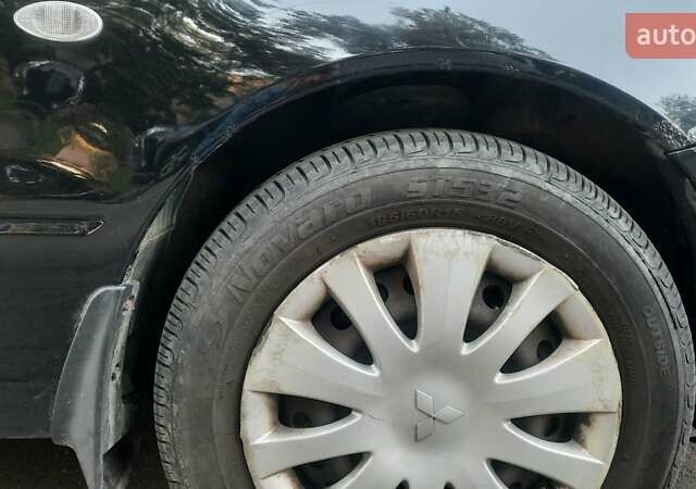 Мицубиси Лансер, объемом двигателя 1.6 л и пробегом 186 тыс. км за 4500 $, фото 17 на Automoto.ua