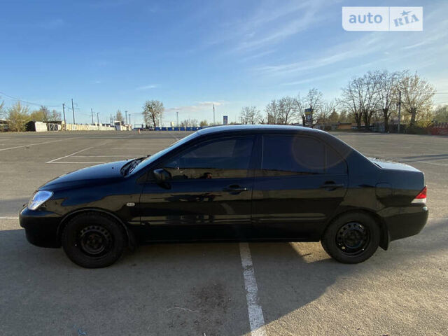 Міцубісі Lancer, об'ємом двигуна 1.6 л та пробігом 209 тис. км за 4000 $, фото 2 на Automoto.ua