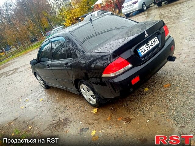 Мицубиси Лансер, объемом двигателя 1.6 л и пробегом 200 тыс. км за 3999 $, фото 2 на Automoto.ua