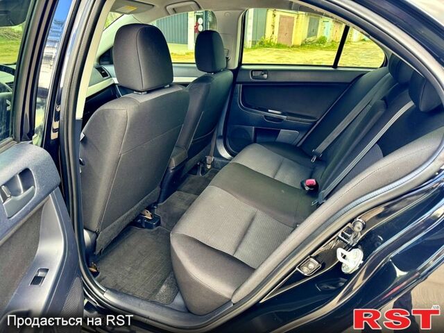 Мицубиси Лансер, объемом двигателя 2 л и пробегом 204 тыс. км за 7590 $, фото 9 на Automoto.ua