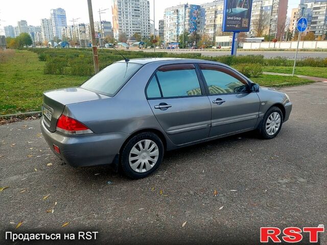 Мицубиси Лансер, объемом двигателя 1.6 л и пробегом 238 тыс. км за 3000 $, фото 3 на Automoto.ua