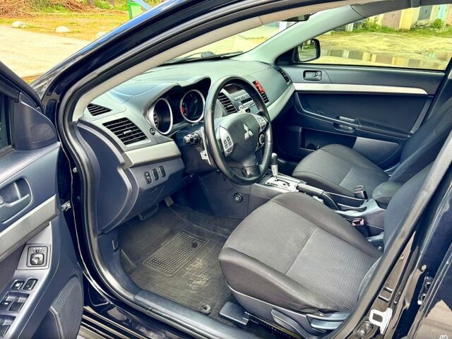 Мицубиси Лансер, объемом двигателя 2 л и пробегом 204 тыс. км за 7590 $, фото 7 на Automoto.ua