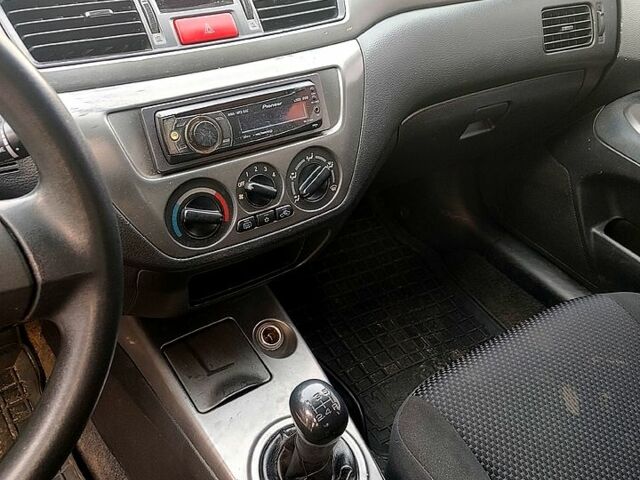 Мицубиси Лансер, объемом двигателя 1.6 л и пробегом 238 тыс. км за 3000 $, фото 12 на Automoto.ua