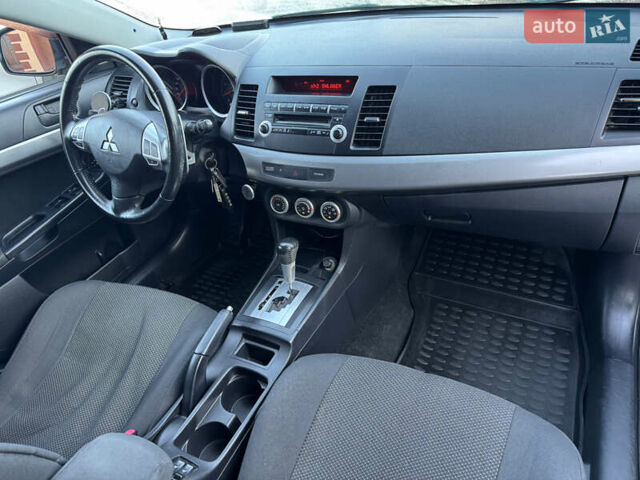 Міцубісі Lancer, об'ємом двигуна 2 л та пробігом 235 тис. км за 7500 $, фото 9 на Automoto.ua