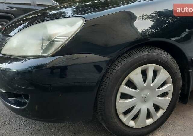 Мицубиси Лансер, объемом двигателя 1.6 л и пробегом 186 тыс. км за 4500 $, фото 14 на Automoto.ua