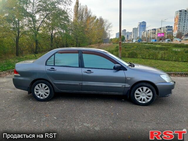 Мицубиси Лансер, объемом двигателя 1.6 л и пробегом 238 тыс. км за 3000 $, фото 4 на Automoto.ua