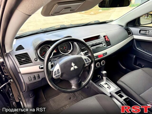 Мицубиси Лансер, объемом двигателя 2 л и пробегом 204 тыс. км за 7590 $, фото 8 на Automoto.ua
