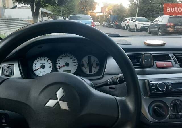 Мицубиси Лансер, объемом двигателя 1.6 л и пробегом 186 тыс. км за 4500 $, фото 5 на Automoto.ua