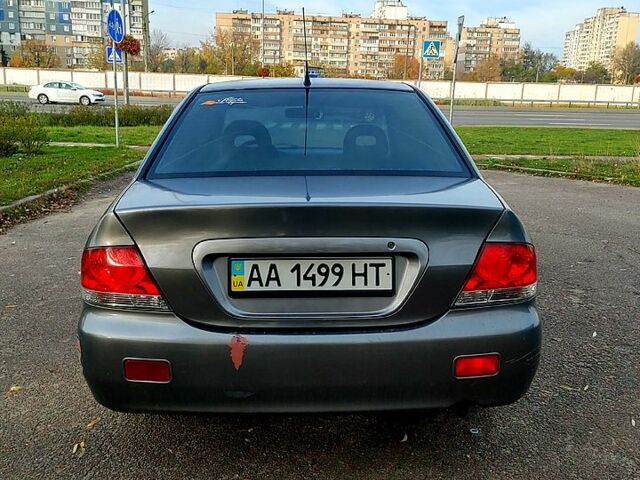 Мицубиси Лансер, объемом двигателя 1.6 л и пробегом 238 тыс. км за 3000 $, фото 2 на Automoto.ua