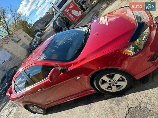 Міцубісі Lancer 2008 у Києві на Automoto.ua Міцубісі Lancer, об'ємом двигуна 2 л та пробігом 270 тис. км за 7300 $, фото 7 на Automoto.ua