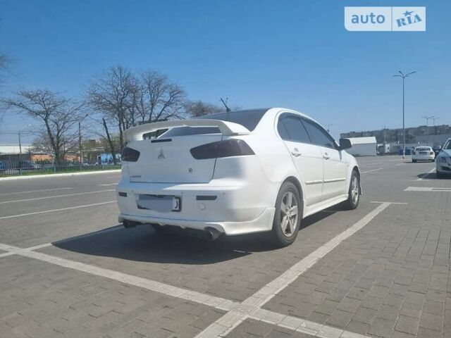 Міцубісі Lancer, об'ємом двигуна 2 л та пробігом 213 тис. км за 7400 $, фото 5 на Automoto.ua