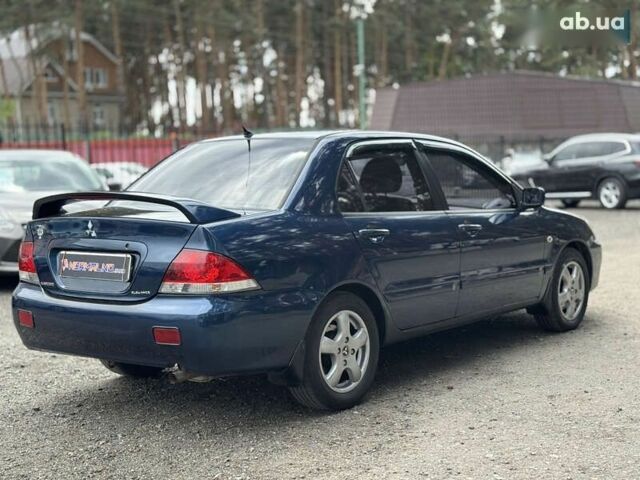 Мицубиси Лансер, объемом двигателя 1.6 л и пробегом 232 тыс. км за 4400 $, фото 5 на Automoto.ua