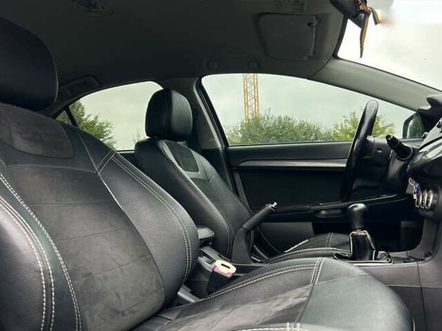 Мицубиси Лансер 2008 в Львове на Automoto.ua Мицубиси Лансер, объемом двигателя 2 л и пробегом 250 тыс. км за 6650 $, фото 16 на Automoto.ua