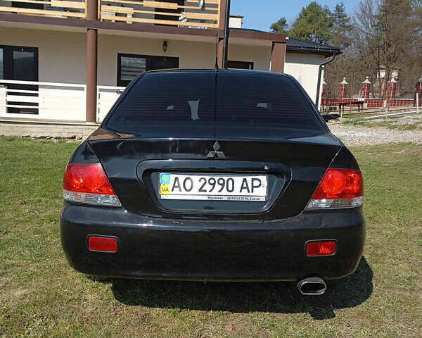 Мицубиси Лансер, объемом двигателя 1.6 л и пробегом 185 тыс. км за 5000 $, фото 4 на Automoto.ua