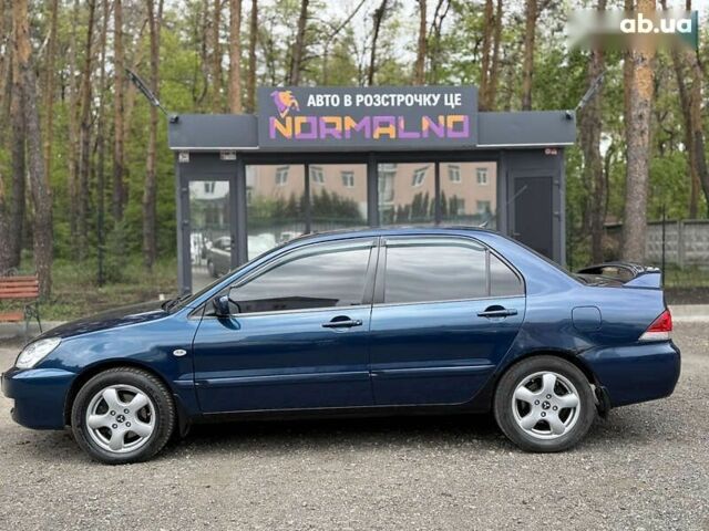 Мицубиси Лансер, объемом двигателя 1.6 л и пробегом 232 тыс. км за 4400 $, фото 7 на Automoto.ua