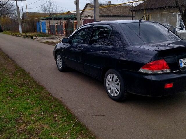 Мицубиси Лансер, объемом двигателя 1.6 л и пробегом 230 тыс. км за 3400 $, фото 3 на Automoto.ua