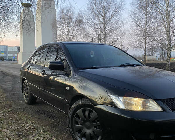 Міцубісі Lancer, об'ємом двигуна 1.6 л та пробігом 175 тис. км за 7000 $, фото 8 на Automoto.ua