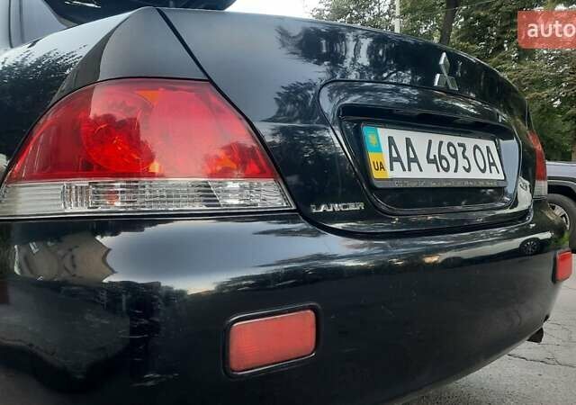 Мицубиси Лансер, объемом двигателя 1.6 л и пробегом 186 тыс. км за 4500 $, фото 10 на Automoto.ua