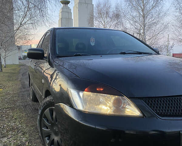 Міцубісі Lancer, об'ємом двигуна 1.6 л та пробігом 175 тис. км за 7000 $, фото 10 на Automoto.ua