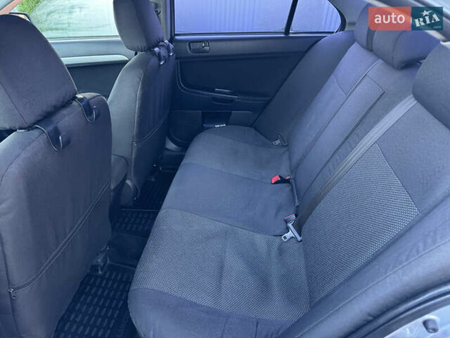Міцубісі Lancer, об'ємом двигуна 2 л та пробігом 235 тис. км за 7500 $, фото 8 на Automoto.ua
