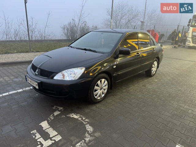 Міцубісі Lancer, об'ємом двигуна 1.6 л та пробігом 198 тис. км за 3850 $, фото 13 на Automoto.ua