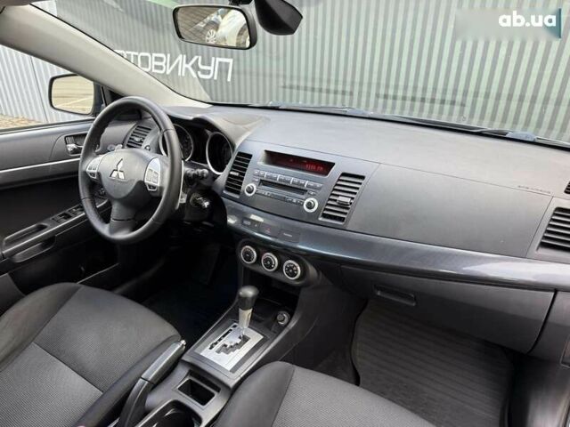 Міцубісі Lancer, об'ємом двигуна 2 л та пробігом 230 тис. км за 6800 $, фото 26 на Automoto.ua