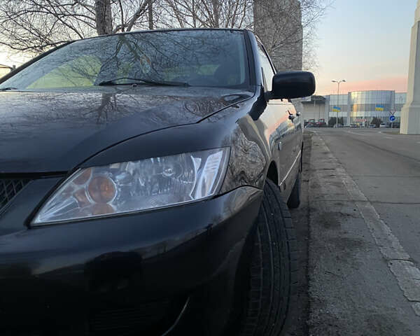 Міцубісі Lancer, об'ємом двигуна 1.6 л та пробігом 175 тис. км за 7000 $, фото 17 на Automoto.ua