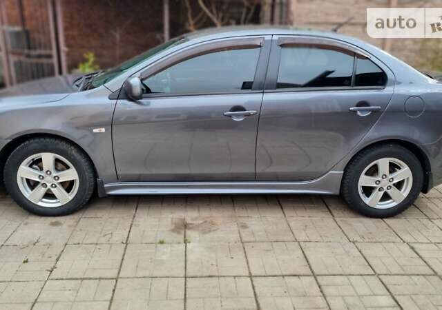 Міцубісі Lancer, об'ємом двигуна 2 л та пробігом 255 тис. км за 6900 $, фото 1 на Automoto.ua