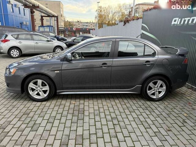 Міцубісі Lancer, об'ємом двигуна 2 л та пробігом 230 тис. км за 6800 $, фото 12 на Automoto.ua