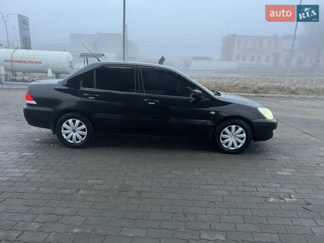 Міцубісі Lancer, об'ємом двигуна 1.6 л та пробігом 198 тис. км за 3850 $, фото 8 на Automoto.ua