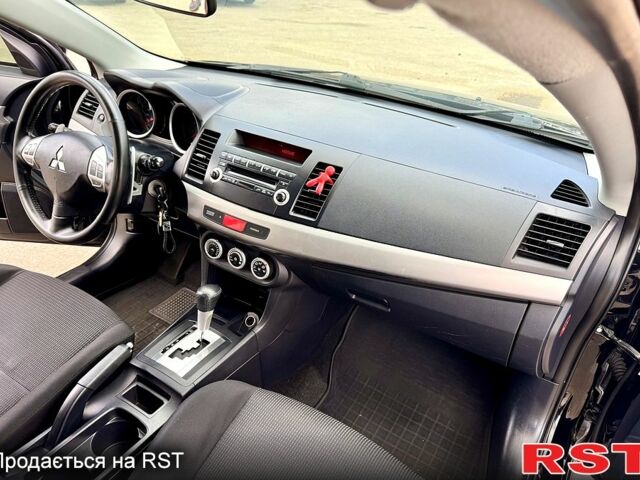 Мицубиси Лансер, объемом двигателя 2 л и пробегом 204 тыс. км за 7590 $, фото 11 на Automoto.ua