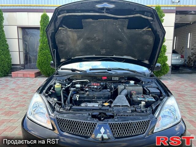 Міцубісі Lancer, об'ємом двигуна 1.6 л та пробігом 243 тис. км за 4800 $, фото 7 на Automoto.ua