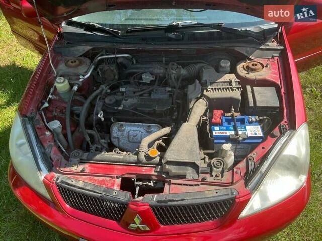 Мицубиси Лансер, объемом двигателя 1.6 л и пробегом 159 тыс. км за 4450 $, фото 17 на Automoto.ua