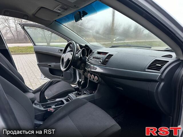 Міцубісі Lancer, об'ємом двигуна 2 л та пробігом 275 тис. км за 4999 $, фото 12 на Automoto.ua