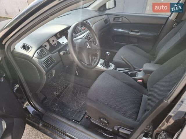 Мицубиси Лансер, объемом двигателя 1.6 л и пробегом 131 тыс. км за 6400 $, фото 5 на Automoto.ua