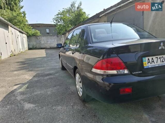 Мицубиси Лансер, объемом двигателя 1.6 л и пробегом 131 тыс. км за 6400 $, фото 4 на Automoto.ua