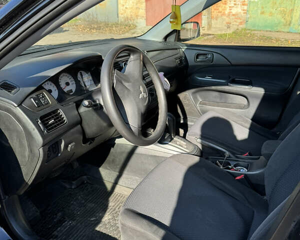 Міцубісі Lancer, об'ємом двигуна 1.6 л та пробігом 142 тис. км за 4900 $, фото 4 на Automoto.ua