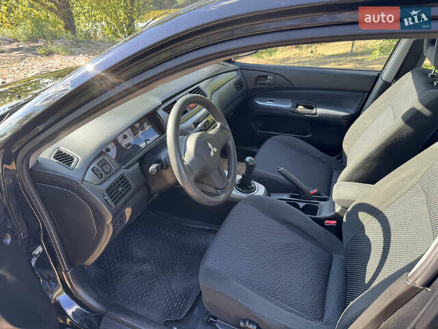 Міцубісі Lancer, об'ємом двигуна 1.6 л та пробігом 126 тис. км за 6199 $, фото 23 на Automoto.ua