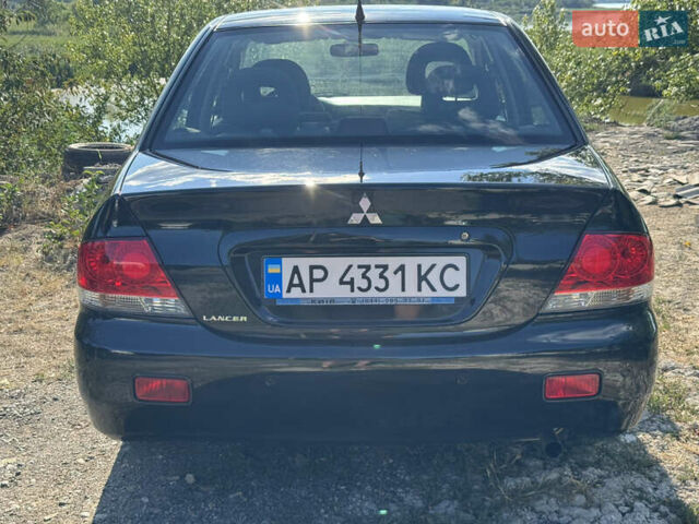 Міцубісі Lancer, об'ємом двигуна 1.6 л та пробігом 126 тис. км за 6199 $, фото 7 на Automoto.ua