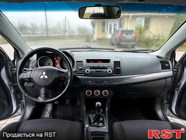 Міцубісі Lancer, об'ємом двигуна 2 л та пробігом 275 тис. км за 4999 $, фото 11 на Automoto.ua