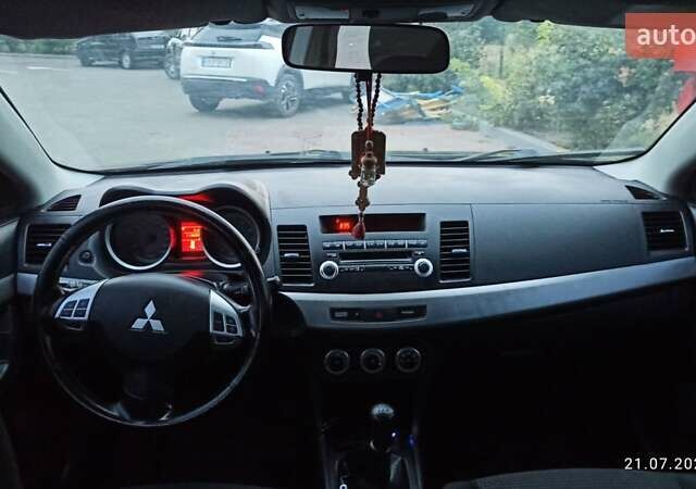 Міцубісі Lancer, об'ємом двигуна 2 л та пробігом 116 тис. км за 8200 $, фото 12 на Automoto.ua