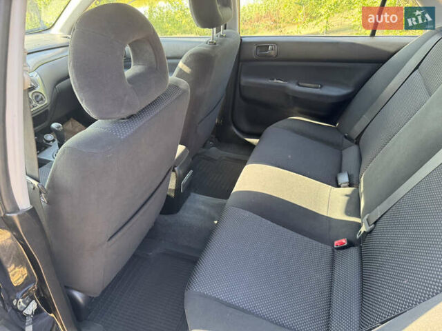 Міцубісі Lancer, об'ємом двигуна 1.6 л та пробігом 126 тис. км за 5799 $, фото 20 на Automoto.ua