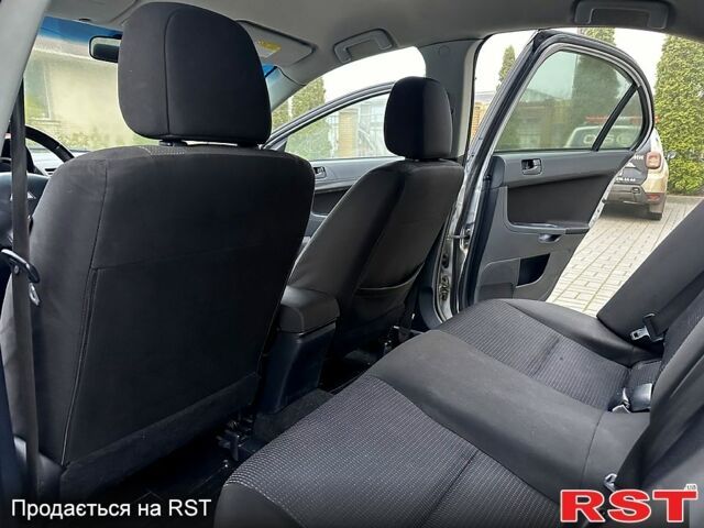Міцубісі Lancer, об'ємом двигуна 2 л та пробігом 275 тис. км за 4999 $, фото 10 на Automoto.ua