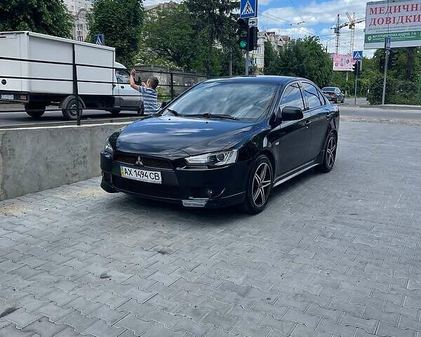 Міцубісі Lancer, об'ємом двигуна 2 л та пробігом 178 тис. км за 6599 $, фото 24 на Automoto.ua