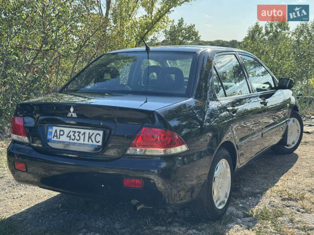 Міцубісі Lancer, об'ємом двигуна 1.6 л та пробігом 126 тис. км за 5799 $, фото 8 на Automoto.ua
