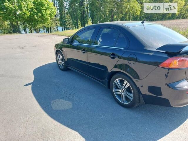 Міцубісі Lancer, об'ємом двигуна 2 л та пробігом 15 тис. км за 13000 $, фото 6 на Automoto.ua