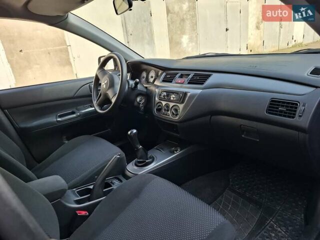 Мицубиси Лансер, объемом двигателя 1.6 л и пробегом 131 тыс. км за 6400 $, фото 15 на Automoto.ua