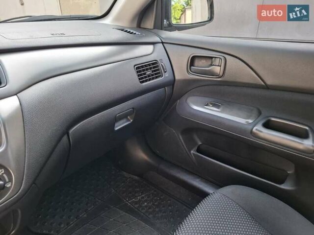 Мицубиси Лансер, объемом двигателя 1.6 л и пробегом 131 тыс. км за 6400 $, фото 10 на Automoto.ua