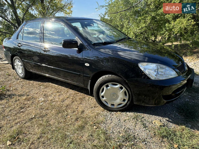 Міцубісі Lancer, об'ємом двигуна 1.6 л та пробігом 126 тис. км за 6199 $, фото 4 на Automoto.ua